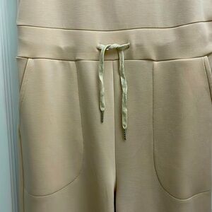 Like new beige stretch jump suit